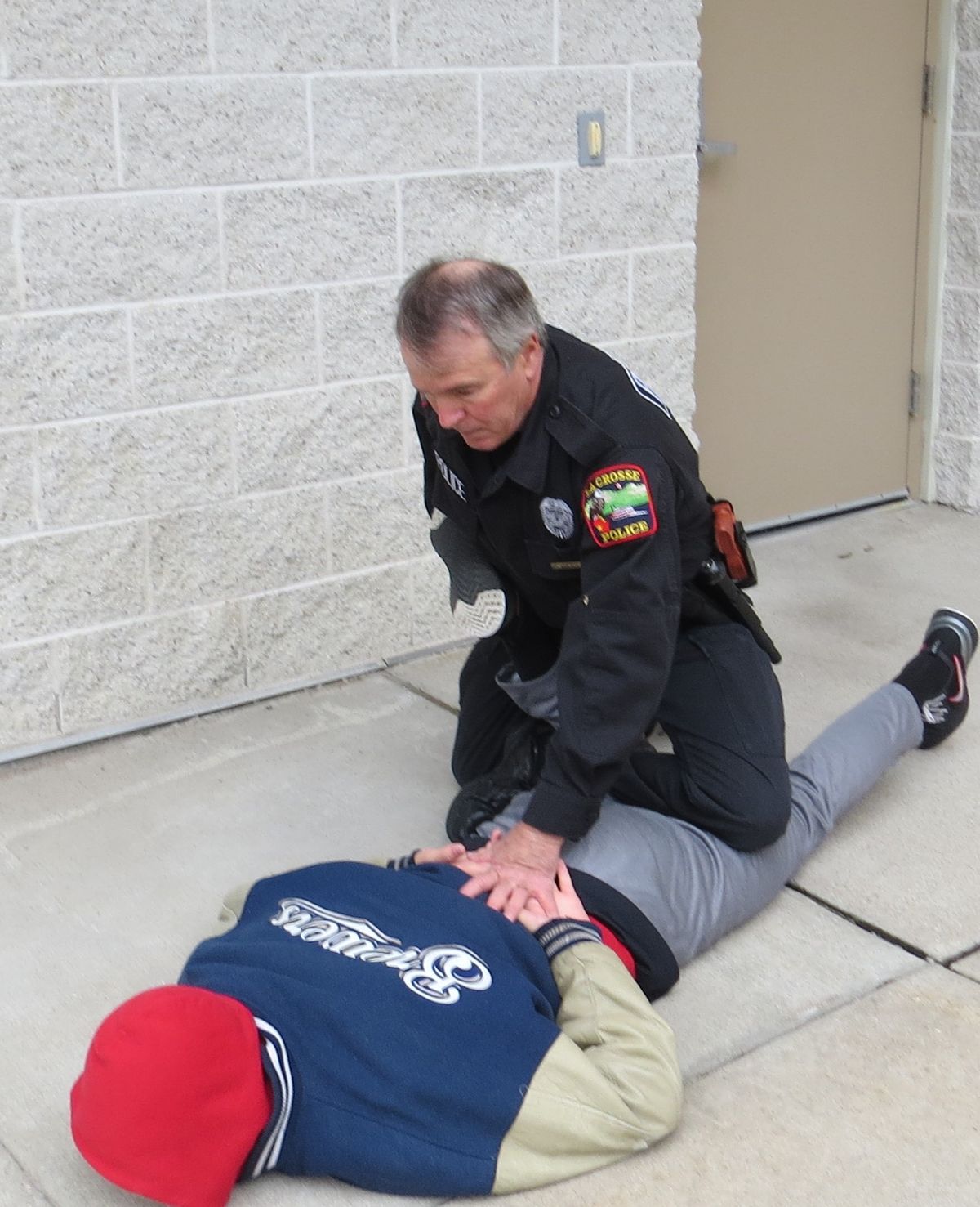 Police training How to use a leg lock on a resistant suspect
